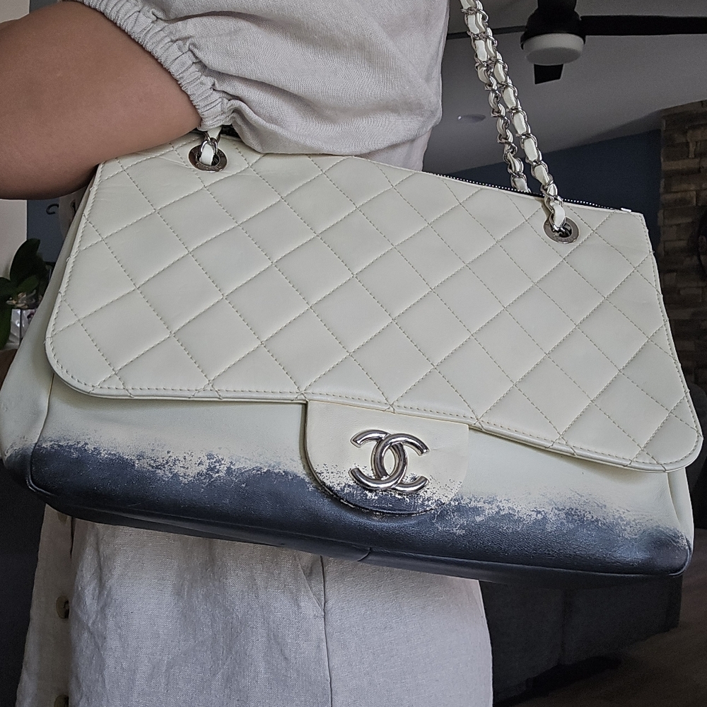 Authentic Chanel Blizzard Zip-flap Shoulder Bag